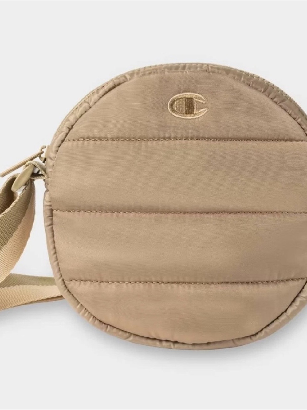 Champion Quilted Round Crossbody Bag in Beige